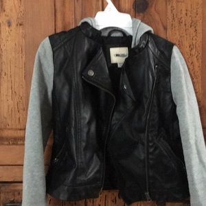 Faux leather jacket w/sweatshirt sleeves & hood.